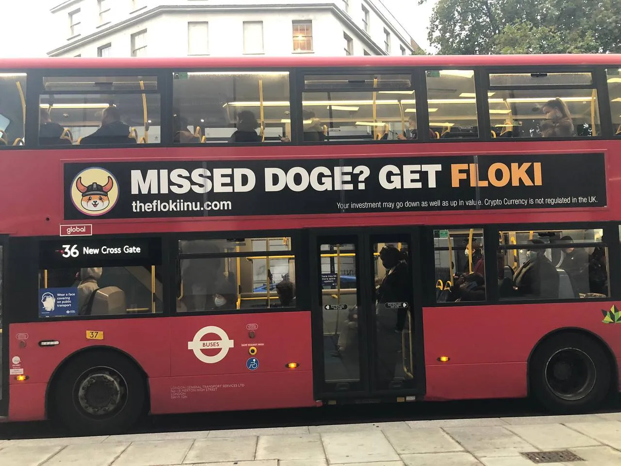 A Floki ad on a London bus.